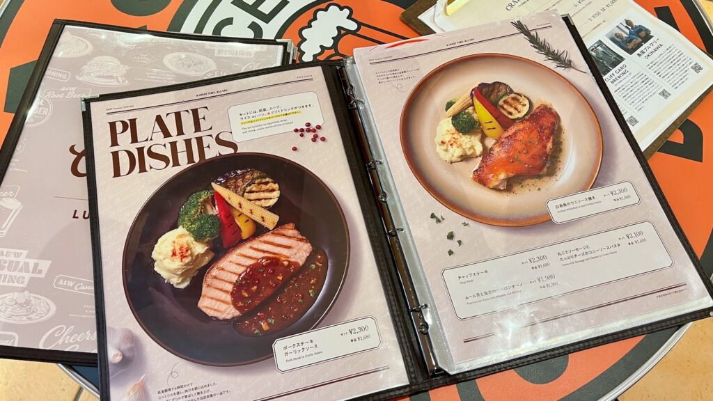 ポークステーキ、白身魚のウニソース焼きの写真が載ったディナーメニュー
